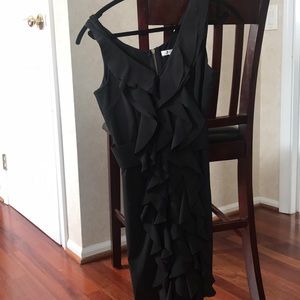 Black dress with ruffles in front and belt
